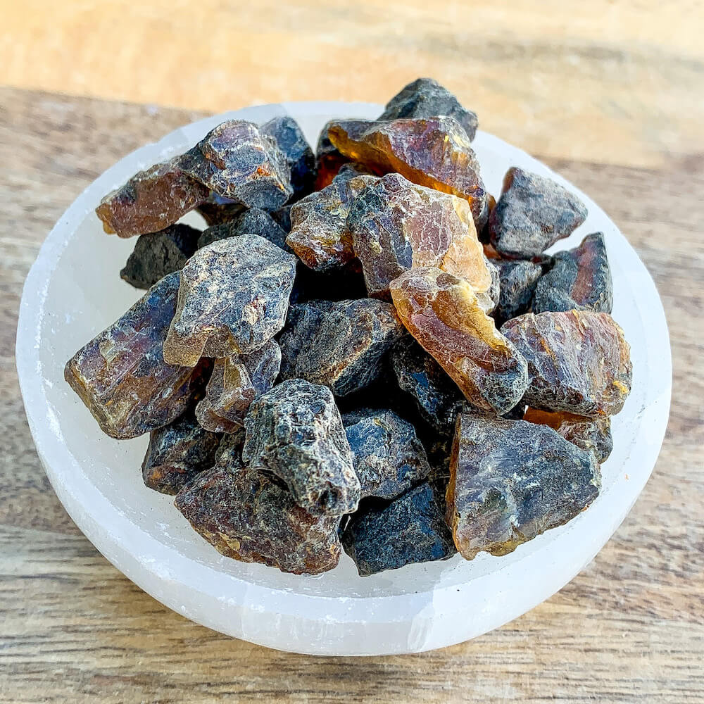 Looking for Raw Amber Stones - Natural Rough Black Amber? Shop Rough Amber at Magic Crystals. We carry a wide variety of natural gemstones.  Perfect Christmas Gift For Her, Gemstone healing stone. Magiccrystals.com carries grade A raw amber chunks