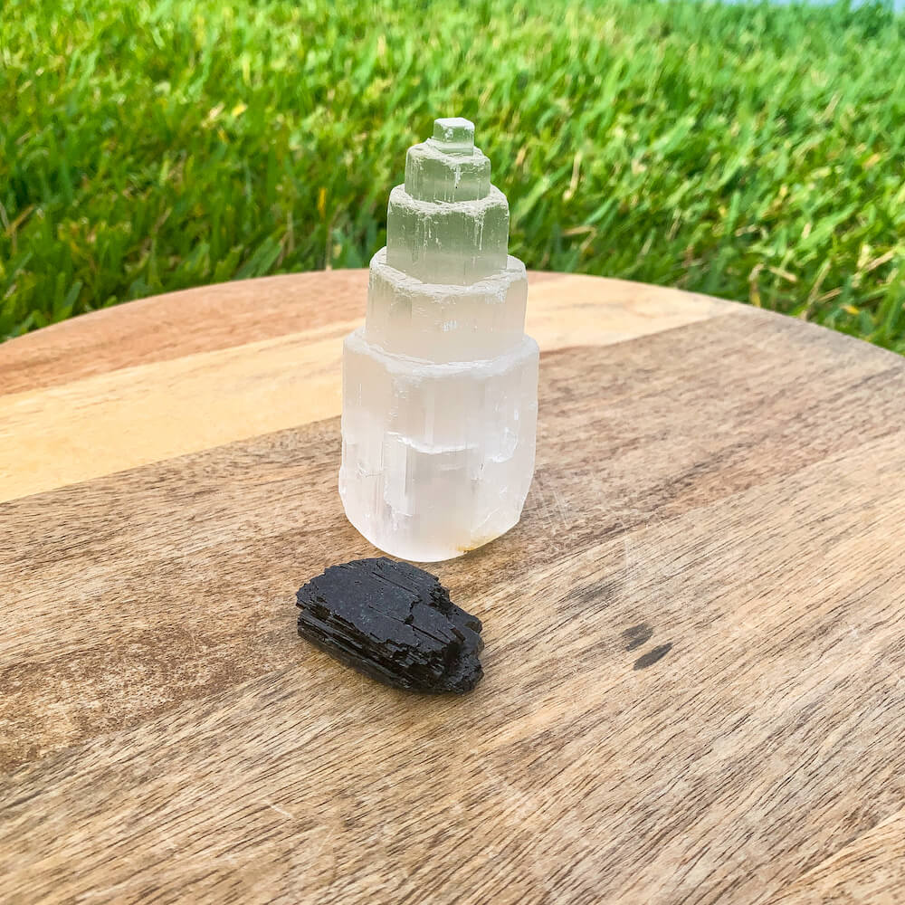 Looking for protection stones? Shop at Magic Crystals for the perfect  Protection Bundle. Raw Selenite Tower and Black Tourmaline Raw help you CLEARING • PROTECTION • SHIELDING your sacred space. Whether it is your home or office. Selenite activates the third eye and Black Tourmaline is meditation crystals.