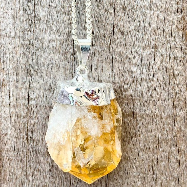 Citrine Stone Silver Necklace. Looking for citrine necklaces? Citrine Jewelry?  Find quality citrine gemstone when you shop at Magic Crystals. Magiccrystals.com is a gemstone and crystals store. Citrine is a solar plexus chakra stone used metaphysically to increase, magnify and clarify personal power and energy.