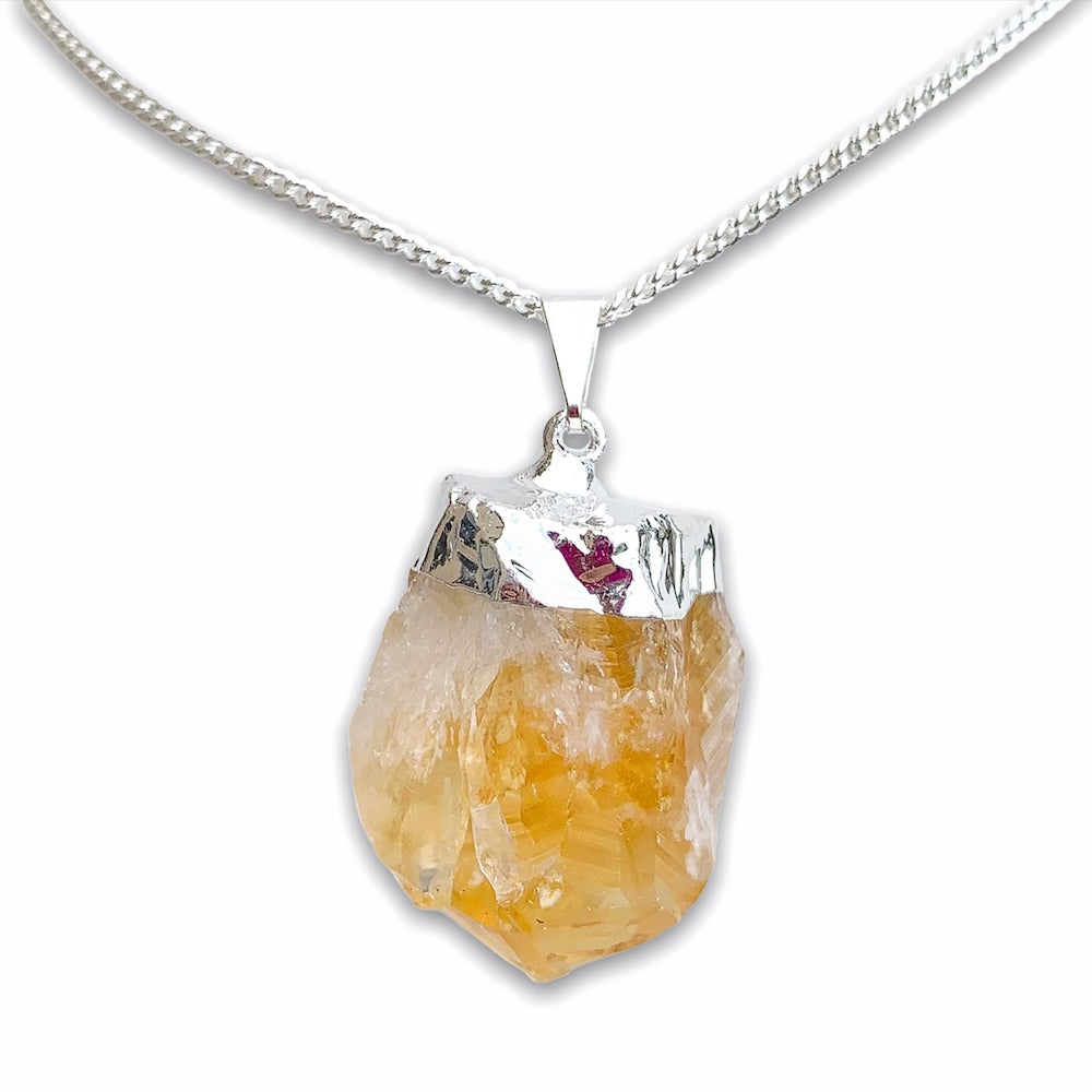 Citrine Stone Silver Necklace. Looking for citrine necklaces? Citrine Jewelry?  Find quality citrine gemstone when you shop at Magic Crystals. Magiccrystals.com is a gemstone and crystals store. Citrine is a solar plexus chakra stone used metaphysically to increase, magnify and clarify personal power and energy