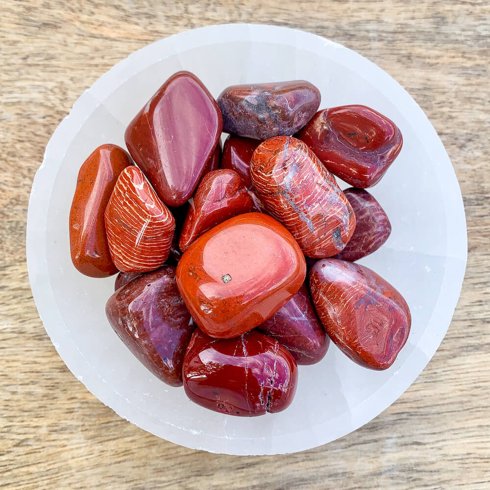 Looking for Tumbled Red Jasper Stone? Shop at Magic crystals and Buy Sunstone Tumbled Stones, Red jasper Polished Gemstones and Bulk Crystals. Red Jasper TUMBLED Brazil - Root chakra - Energy Healing and Reiki. Red Jasper Aids spiritual grounding.