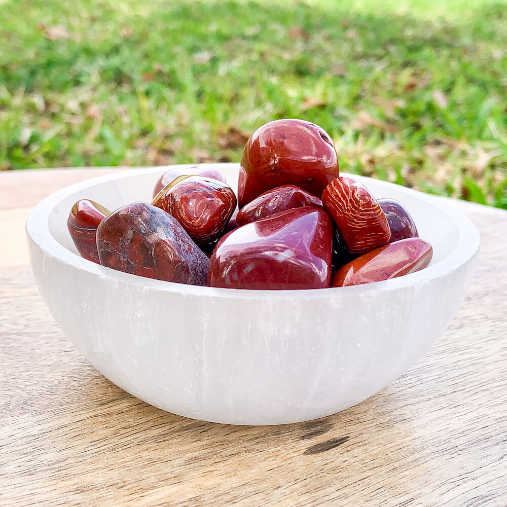 Looking for Tumbled Red Jasper Stone? Shop at Magic crystals and Buy Sunstone Tumbled Stones, Red jasper Polished Gemstones and Bulk Crystals. Red Jasper TUMBLED Brazil - Root chakra - Energy Healing and Reiki. Red Jasper Aids spiritual grounding.