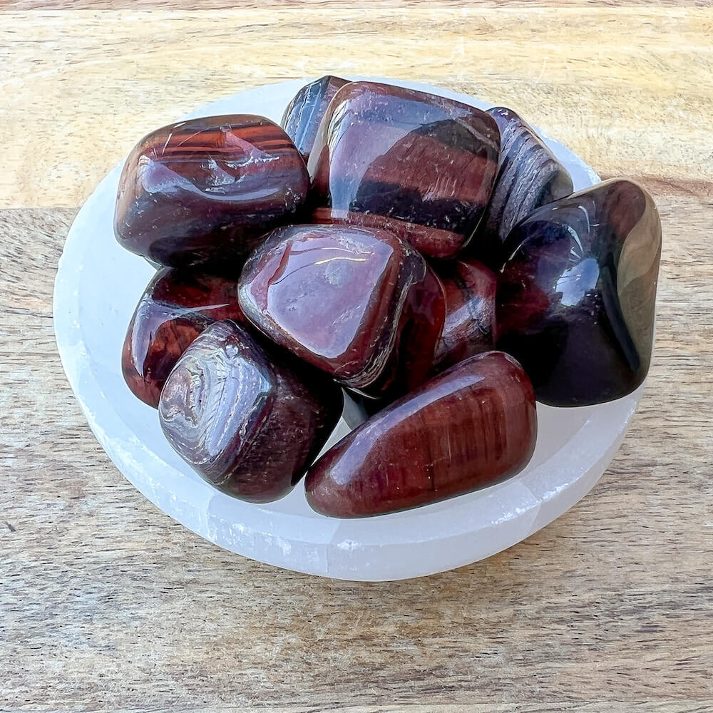 Looking for a Red Tiger's Eye Tumbled? Find the best quality of Red Tiger Eye, Red Pocket Stone when you shop at Magic Crystals. Red Tiger Eye,  STONE of Strength Stone, Courage, Strength. Resembling the properties of the tiger, it keeps you with earth’s energy. FREE SHIPPING AVAILABLE. Root Chakra stone.