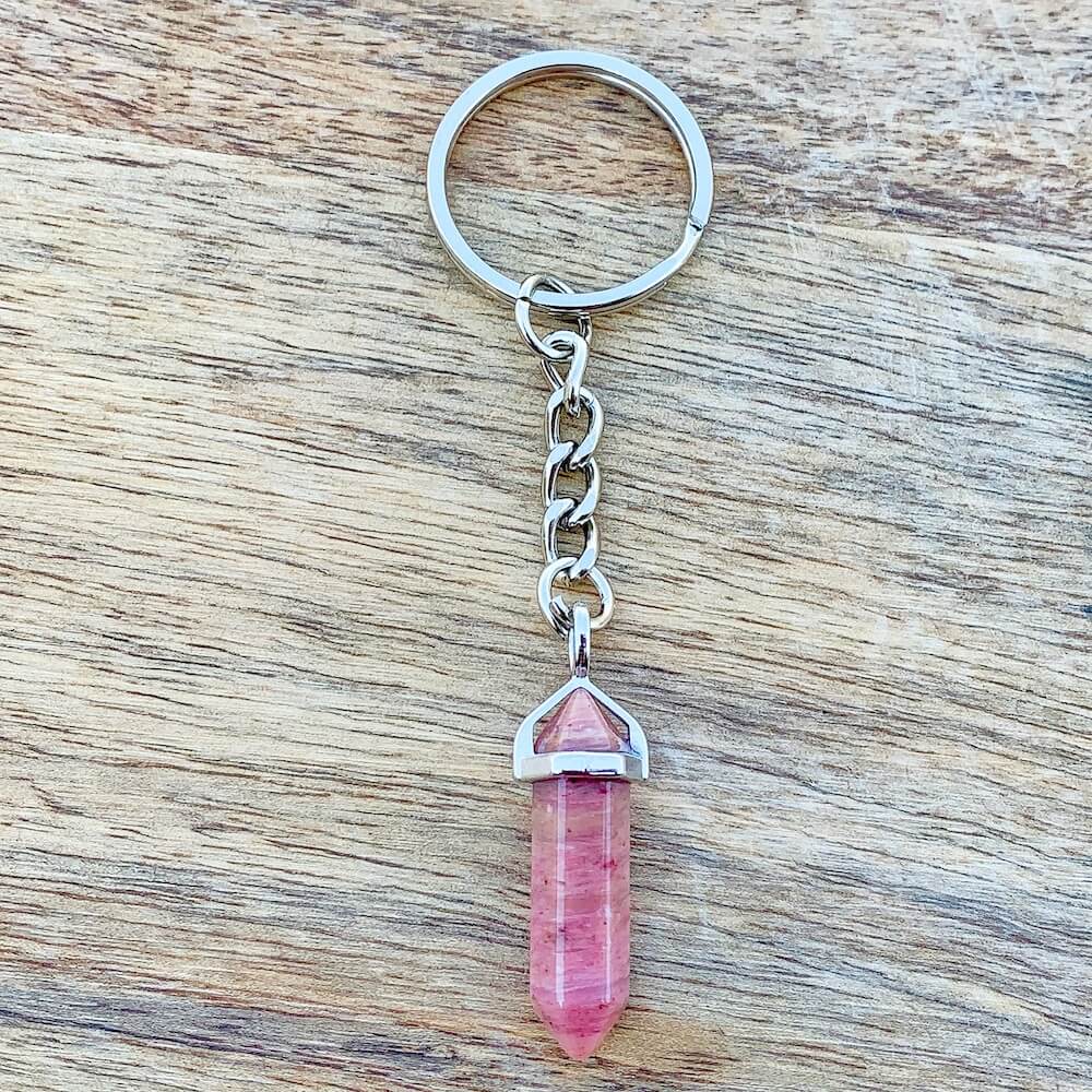 Rhodochrosite KEYCHAIN. Shop at Magic Crystals for Crystal Keychain, Pet Collar Charm, Bag Accessory, natural stone, crystal on the go, keychain charm, gift for her and him. Rhodochrosite is a great SPIRITUALITY. FREE SHIPPING available. Rhodochrosite Crystal Key Chain, Crystal Keyring, Rhodochrosite Crystal Key Holder