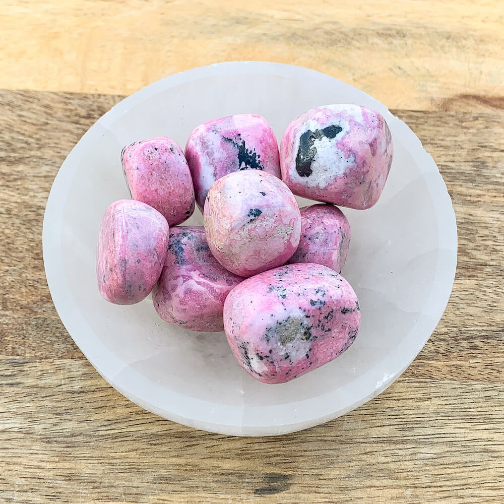 Looking for Rhodochrosite Tumbled Stone? Rhodochrosite gemstones are available in Magic Crystals. Find Rhodochrosite Tumbled Stone (~0.8") - Healing Crystals and Stones - Heart Chakra with FREE SHIPPING available. Rhodochrosite meaning. Polished Rhodochrosite, Small, Medium, Large Tumble Stone