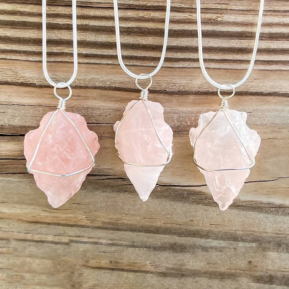 Shop for a beautiful Rose Quartz necklace. Magic Crystals has a wide variety of Rose Quartz Jewelry. Rose Quartz Arrowhead Necklace with free shipping available. is lovely and contains the healing crystal Rose Quartz. This beautiful design is raw and hangs beautifully around the neck. Rough pendant gemstones. 