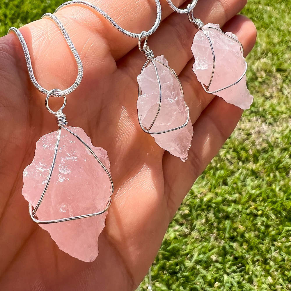 Shop for a beautiful Rose Quartz necklace. Magic Crystals has a wide variety of Rose Quartz Jewelry. Rose Quartz Arrowhead Necklace with free shipping available. is lovely and contains the healing crystal Rose Quartz. This beautiful design is raw and hangs beautifully around the neck. Rough pendant gemstones. 