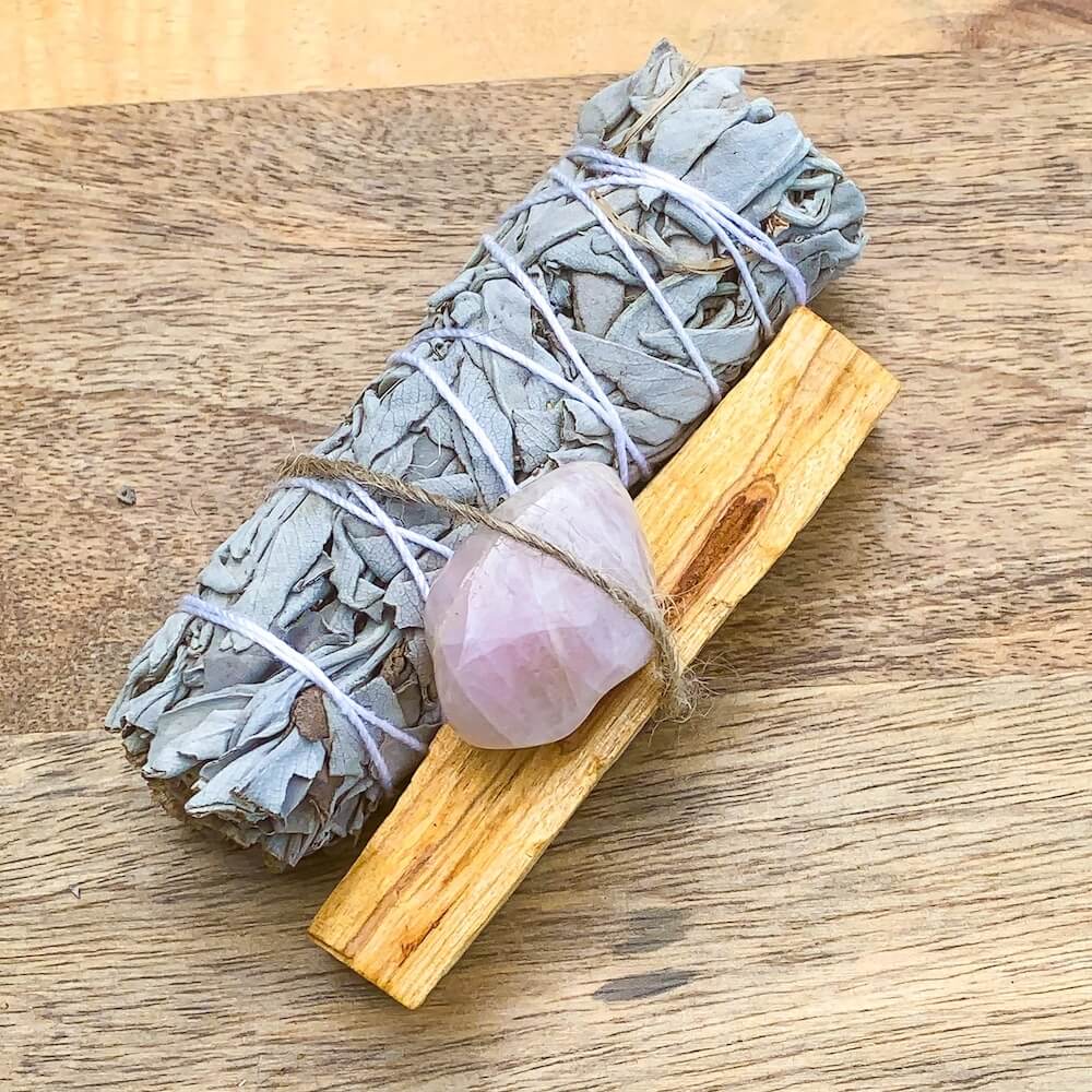 Looking for, where can I buy White Sage, Palo Santo sticks, and Rose Quartz? Shop at Magic Crystals for Rose Quartz Smudge Bundle, Palo Santo, Sage, Rose Quartz - Space Clearing - Home Cleansing Kit - Love and Health Smudge Bundle - Meditation. Smudging for Cleansing and Clearing Your Home, Clearing Negative Energy.