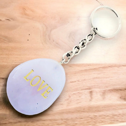 Rose Quartz Palm Stone Keychain. Rose Quartz keychain. Shop at Magic Crystals for Crystal Keychain, Pet Collar Charm, Bag Accessory, natural stone, crystal on the go, keychain charm, gift for her and him. Rose Quartz is a great LOVE. Rose Quartz Natural Stone Keychain, Crystal Keychain,Rose Quartz Crystal Key Holder. Pink gemstone. 