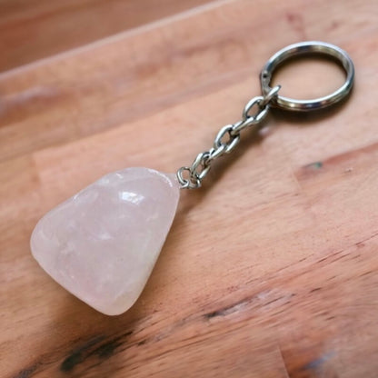 Rose Quartz Tumbled Stone Keychain. Rose Quartz keychain. Shop at Magic Crystals for Crystal Keychain, Pet Collar Charm, Bag Accessory, natural stone, crystal on the go, keychain charm, gift for her and him. Rose Quartz is a great LOVE. Rose Quartz Natural Stone Keychain, Crystal Keychain,Rose Quartz Crystal Key Holder. Pink gemstone. 