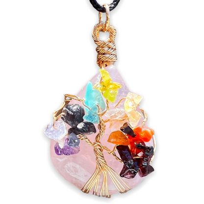 Looking for a gift for mother/her, tree of life necklace, stone necklace, pendant? Shop at Magic Crystals for a Rose Quartz 7 Chakra Tree Of Life Drop Necklace. 7 Chakra necklaces, and seven chakras jewelry pieces. Handmade Natural Rose Quartz Crystal. Rose Quartz Drop shape, teardrop, love Necklaces.
