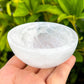 Looking for a selenite bowl with Free Shipping? Shop at Magic Crystals for handcrafted Selenite Ritual Bowl, Charging Bowl, Selenite Alter Bowl, Selenite Bowls, Selenite Cleansing Bowls. Selenite quickly opens and activates the third eye, crown chakra, and the Soul Star chakra above the head. Selenite-2.5-Bowl