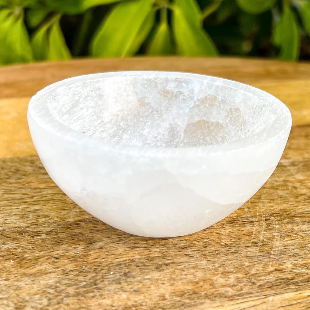 Looking for a selenite bowl with Free Shipping? Shop at Magic Crystals for handcrafted Selenite Ritual Bowl, Charging Bowl, Selenite Alter Bowl, Selenite Bowls, Selenite Cleansing Bowls. Selenite quickly opens and activates the third eye, crown chakra, and the Soul Star chakra above the head. Selenite-2.5-Bowl