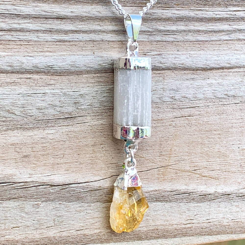 Looking for a Selenite Necklace or Citrine Necklace? Raw Selenite Pendant with Citrine, Amethyst, or Quartz crystal point are available at Magic crystals. We carry genuine Selenite, Citrine stones. FREE SHIPPING available. Selenite necklace - selenite crystal - healing crystals and stones.