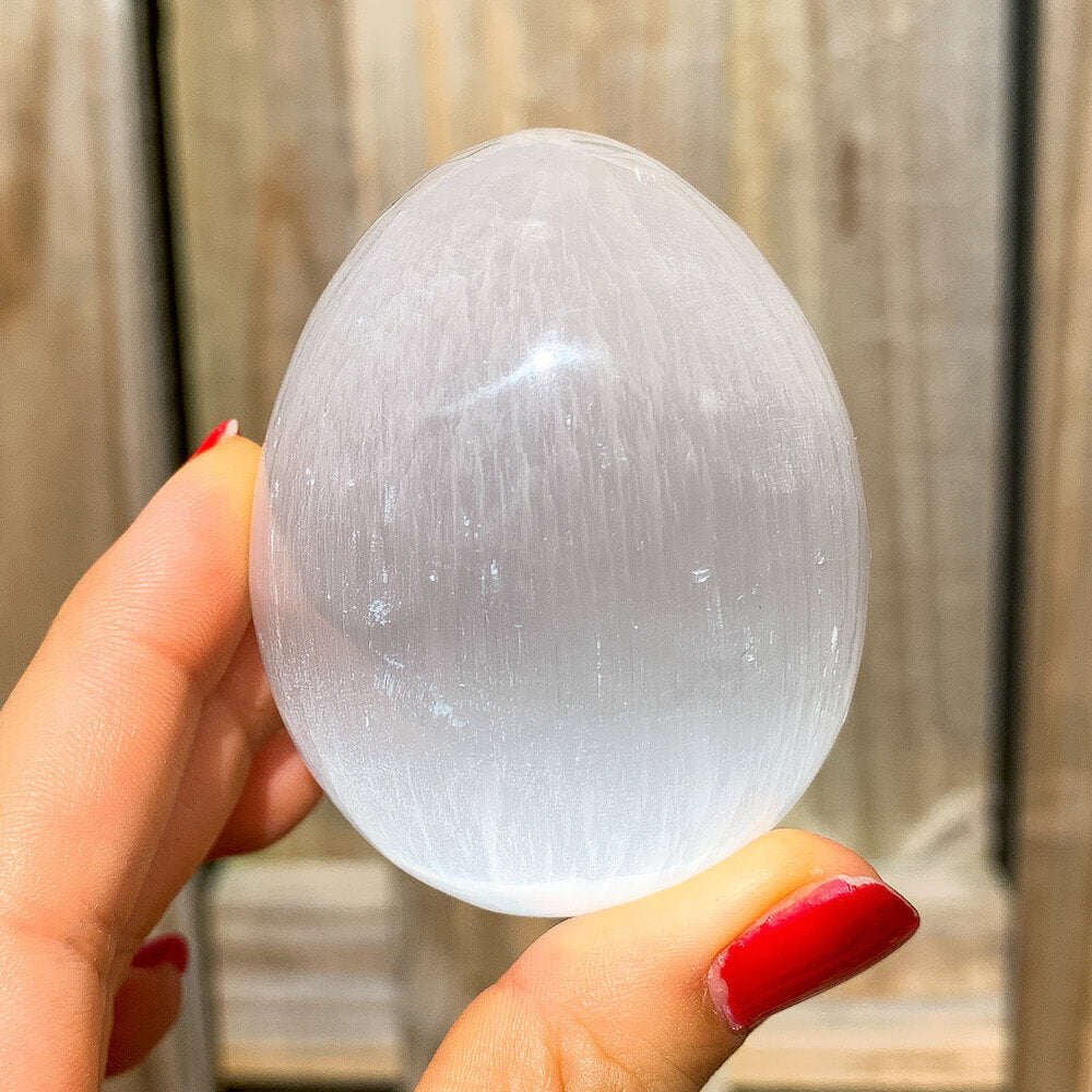Looking for Selenite Eggs from Morocco and white clearing tools? Shop at Magic crystals and Buy Selenite Tumbled Stones, Selenite Polished Sphere Gemstones, and Bulk Crystals. Selenite from Morocco - Selenite - Crown Chakra Crystal - High Vibration -Energy Healing - 7th Chakra and reiki. A protective stone.