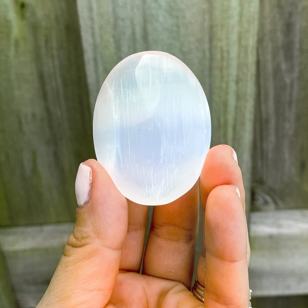 Looking for 2.5" Selenite Palm Stone, Selenite, Soap Shape Palm Stone, Cat Eye Reflection with Free Shipping? Shop at Magic Crystals for Selenite for Ritual plates, Polished Selenite Charging station. Crystal used for Protection Cleansing Meditation Crystal Healing Chakra, Selenite Alter,Selenite Flat Crystal Plate.