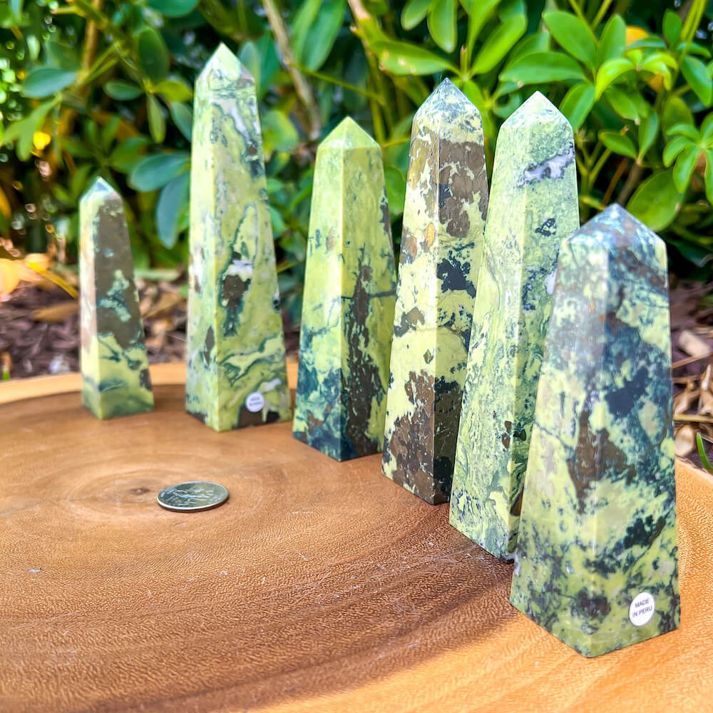 Looking for Green Serpentine Obelisk? Shop at Magiccrystals.com for Genuine Green Peruvian Serpentine Magnatite Tower - Serpentine Tower - Stone Point - Jewelry Making Supplies and more. Magic Crystals FREE SHIPPING on quality crystals. Serpentine is associated with the heart chakra and increases love and nurturing.Serpentine-Obelisk
