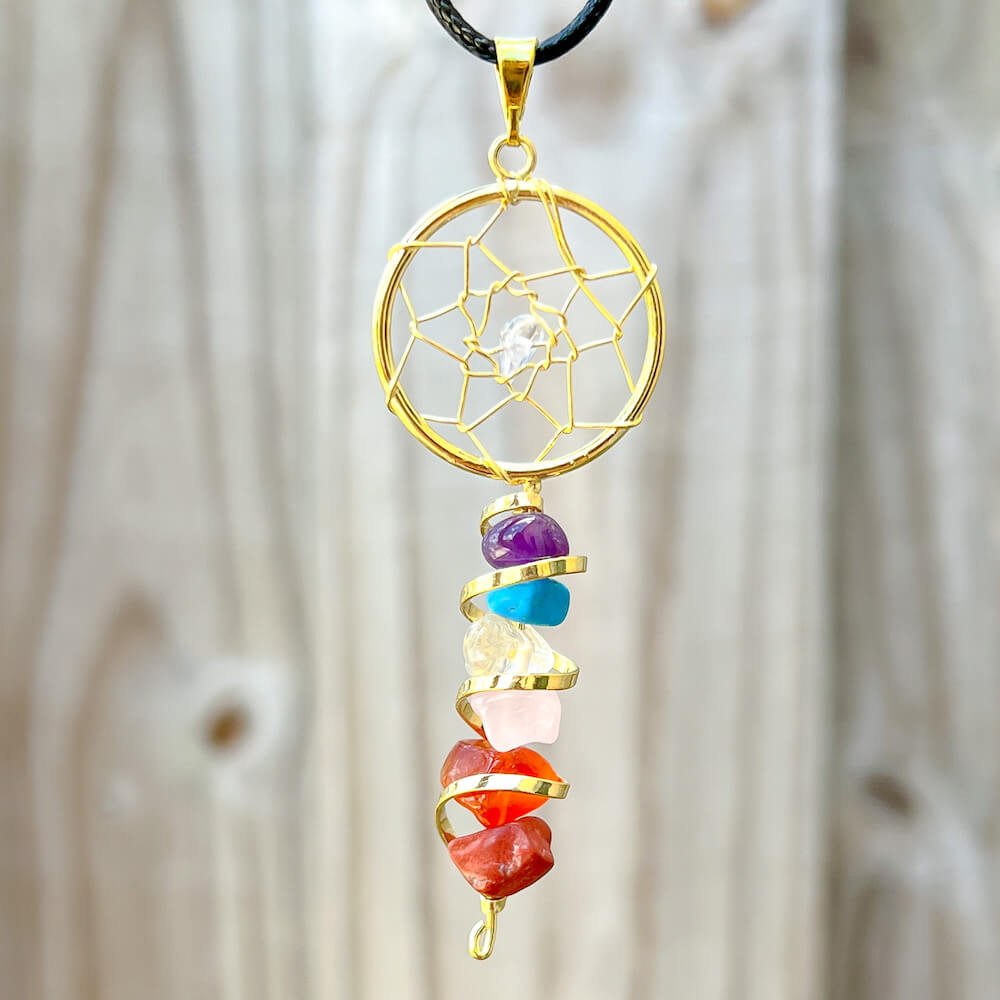 Shop our 7 Chakra Stone Necklace at Magic Crystals. We Have the Very Best Quality and Unique Gemstones Collection. Our items are Hand Crafted and Handmade with Love. This Seven Chakra Infinity Dream Catcher Golden Necklace will Help you Activate your Chakras to Bring Balance and Energy into your Life. 