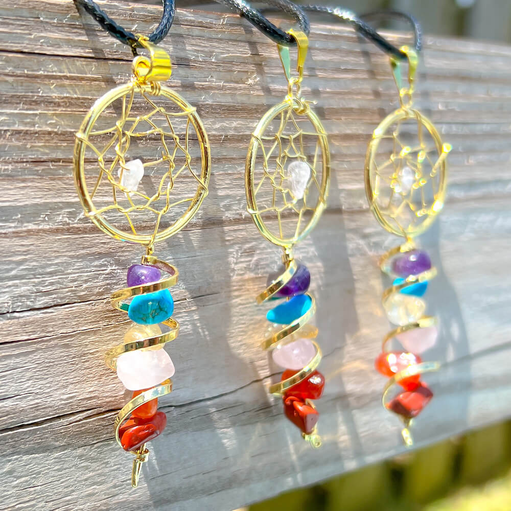 Shop our 7 Chakra Stone Necklace at Magic Crystals. We Have the Very Best Quality and Unique Gemstones Collection. Our items are Hand Crafted and Handmade with Love. This Seven Chakra Infinity Dream Catcher Golden Necklace will Help you Activate your Chakras to Bring Balance and Energy into your Life. 