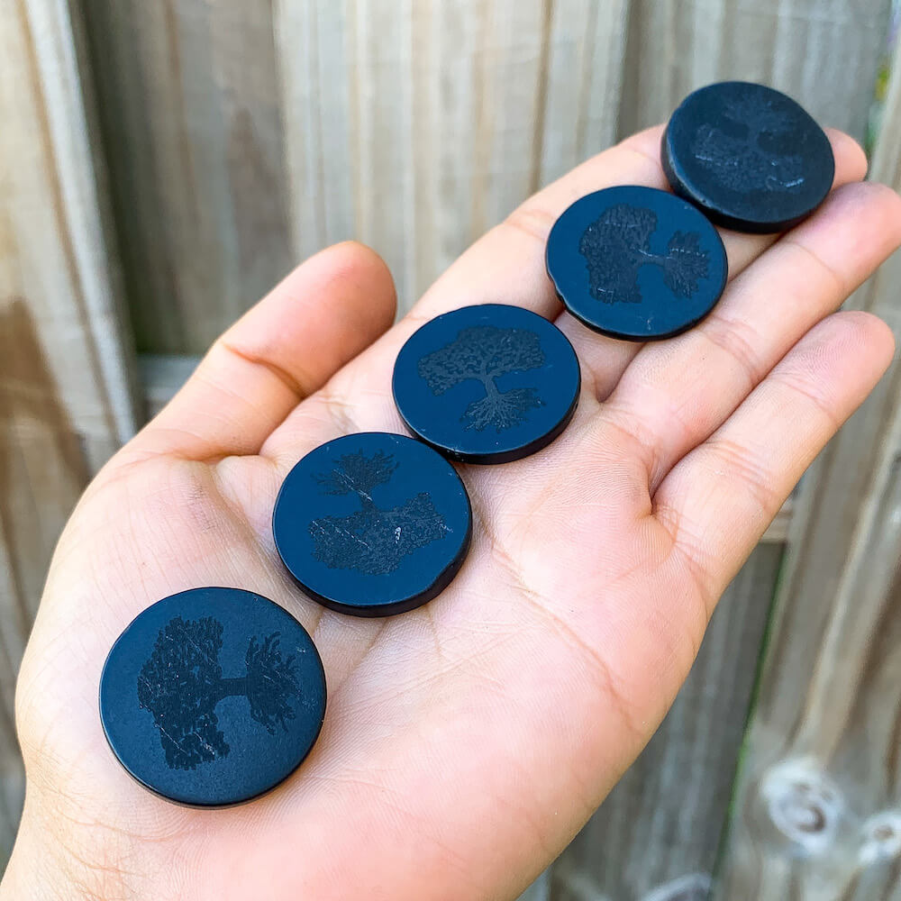 Shop for Shungite at magic crystals. Find Shungite Phone Sticker for EMF Protection Tools at Magic Crystals. Purification, Reiki, EMF Protection.Shungite plates for cell phone Engraved images | Made of natural shungite stone various image | Shungite EMF protection shield sticker.