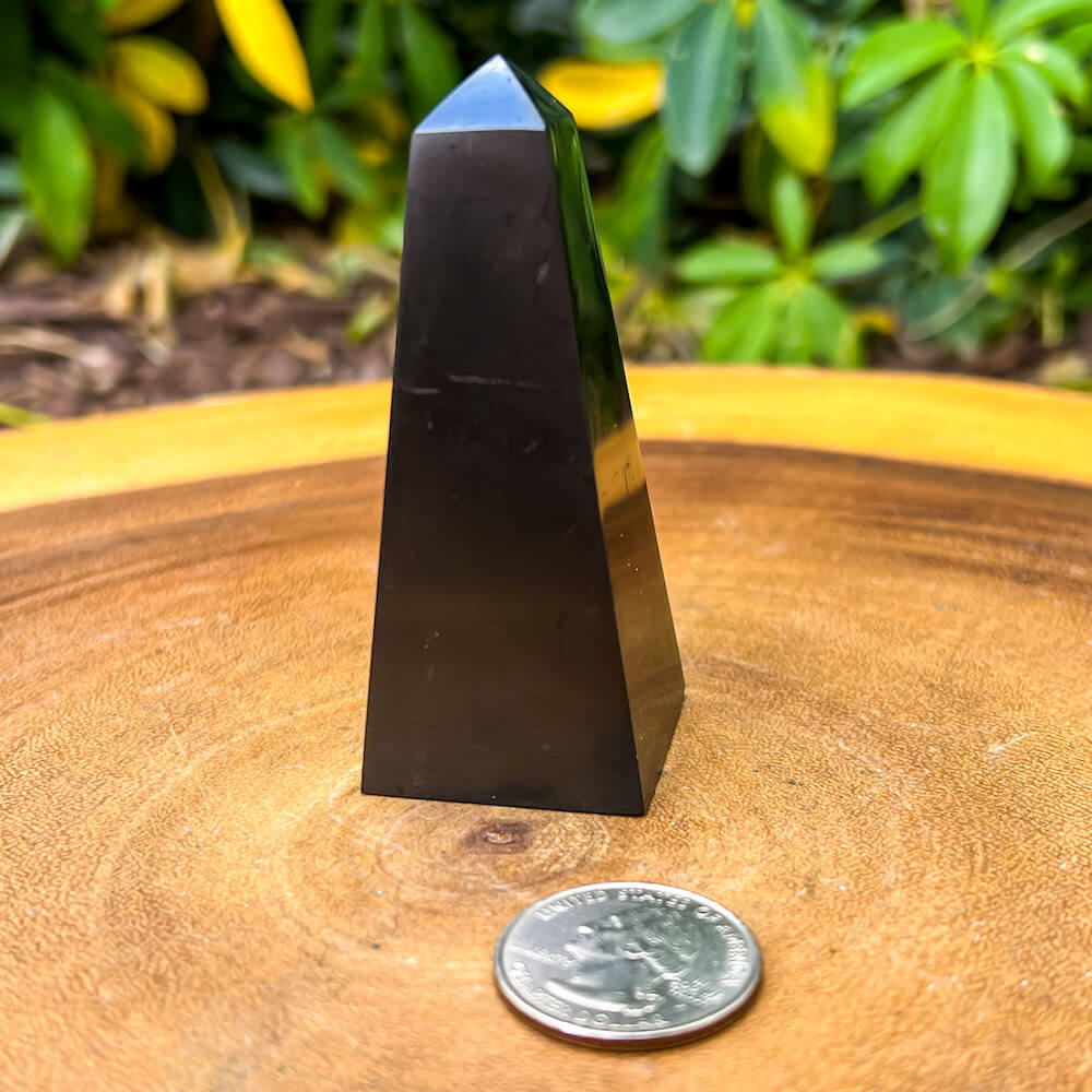 Shungite obelisk helps for EMF Protection. obelisk is Black Polished Authentic from Karelian for Anti-Radiation. Shungite Stone Figure from Karelia Energy obelisk from Russia. Chakra Healing Stone, Block EMF's WIFI Radiation 5G at magiccrystals.com . Shop online with FREE SHIPPING AVAILABLE.
