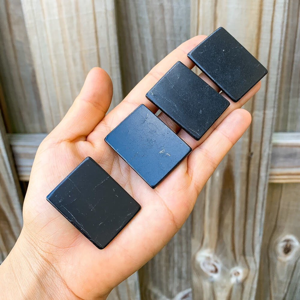 Shop for Shungite at magic crystals. Find Shungite Phone Rectangle Sticker for EMF Protection Tools at Magic Crystals. Purification, Reiki, EMF Protection.Shungite plates for cell phone Engraved images | Made of natural shungite stone various image | Shungite EMF protection shield sticker.