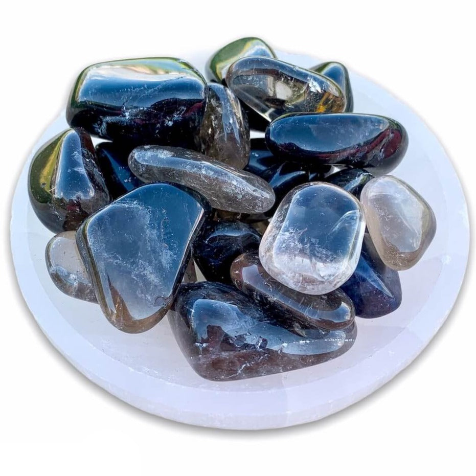 Buy Smokey Quartz Tumbled Stones, Smokey Quartz Polished Gemstones, Polished Gray Stone, Bulk Crystals at Magic Crystals. Smokey Quartz helps anyone get the grounding they need to make the logical choices that will achieve their goals. FREE SHIPPING available.