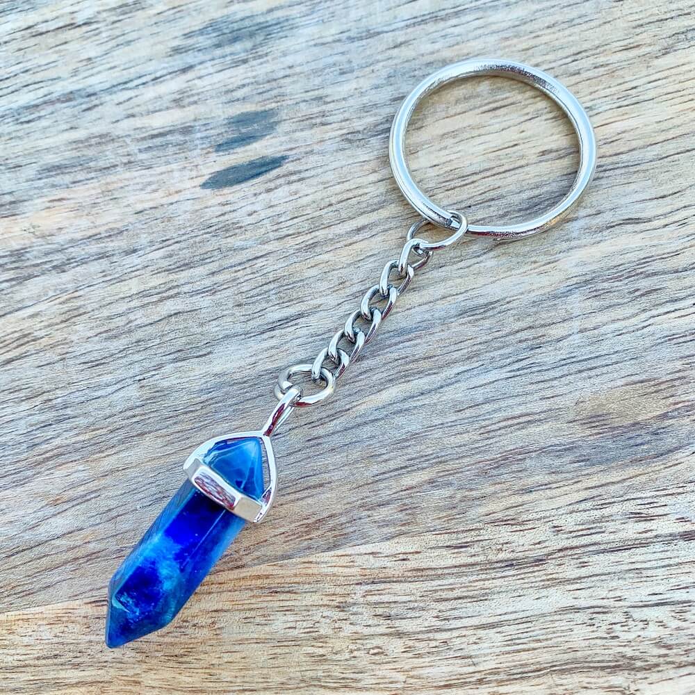 Blue Sodalite KEYCHAIN. Shop at Magic Crystals for Crystal Keychain, Pet Collar Charm, Bag Accessory, natural stone, crystal on the go, keychain charm, gift for her and him. Sodalite is great for SPIRITUALITY. FREE SHIPPING available. Sodalite Crystal Key Chain, Crystal Keyring, Sodalite Crystal Key Holder.