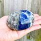 Looking for sodalite stones? Shop at our crystal shop for genuine Sodalite Polished gemstone, Sodalite Stone, Blue Sodalite at Magic Crystals. Natural Sodalite Gemstone for CALMNESS, SELF-ESTEEM , INTUITION. Magiccrystals.com offers the best quality gemstones.