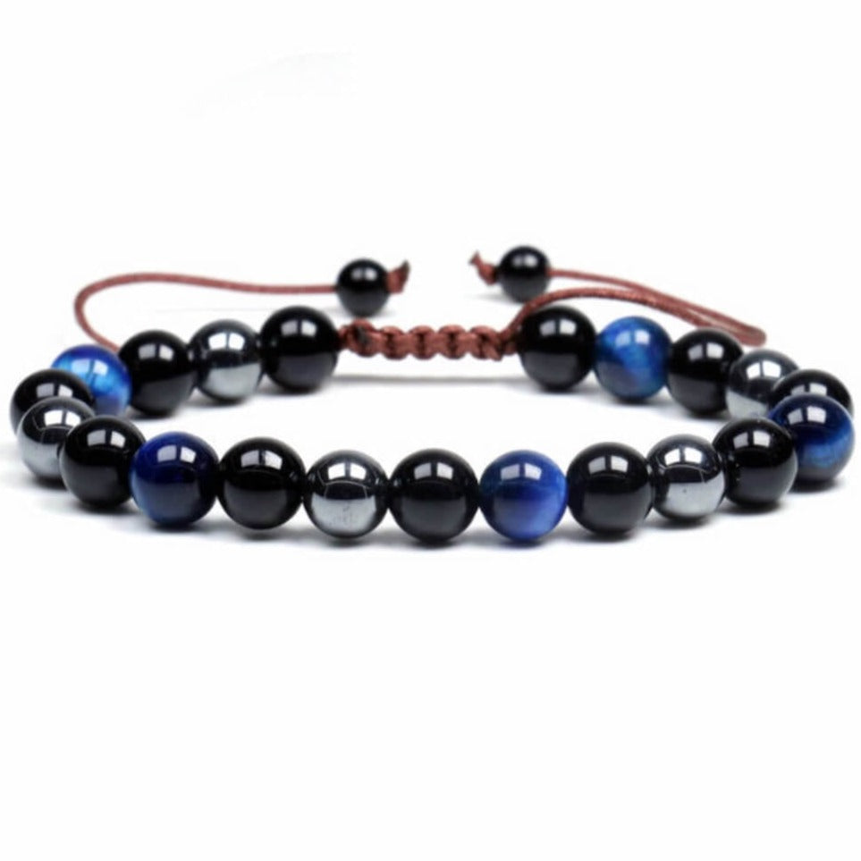 Looking for a adjustable bracelet? Shop at Magic Crystals for Blue Tiger Eye, Hematite, and Black Obsidian Adjustable Bracelet. Bracelet made of natural gemstones and Lava stones for Oils Diffuser. Unisex jewelry adjustable bracelet. Color: Black and metallic, gray for Chakra: Third Eye, Solar Plexus, Sacral, Root. FREE SHIPPING