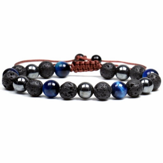 Looking for an adjustable bracelet? Shop at Magic Crystals for Blue Tiger Eye, Hematite, and Lava Stone Adjustable Bracelet. Bracelet made of natural gemstones and Lava stones for Oils Diffuser. Unisex jewelry adjustable bracelet. Color: Black, gray for Chakra: Third Eye, Solar Plexus, Sacral, Root. FREE SHIPPING
