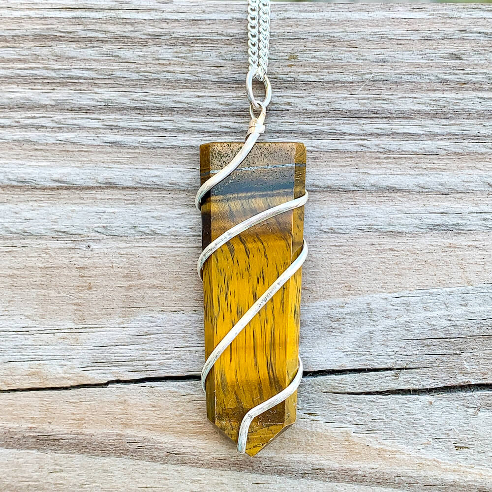Tiger-Eye-Flat-Obelisk-Pendant.  Looking for a handmade Gemstone Obelisk Necklace? Find the best quality  Obelisk Wire Wrap Pendant w/ Plated Chain,  Wire Wrapped Necklace, Obelisk jewelry, Wire Wrap necklaces, Crown Chakra, Healing when you shop at Magic Crystals. FREE SHIPPING available. Rose Quartz  Flat Point In Silver Spiral Pendant.