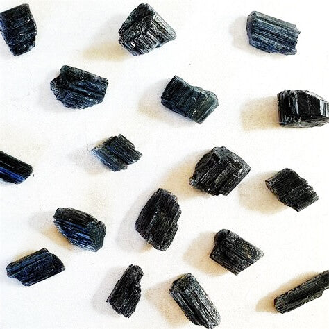 Shop for Black Tourmaline Crystal Chunks -  Rough Tourmaline at Magic Crystals . Black Tourmaline is a perfect mineral to protect your aura. FREE SHIPPING available. Tourmaline Raw stones. Genuine black tourmaline discs, pointers, crystals and stones.
