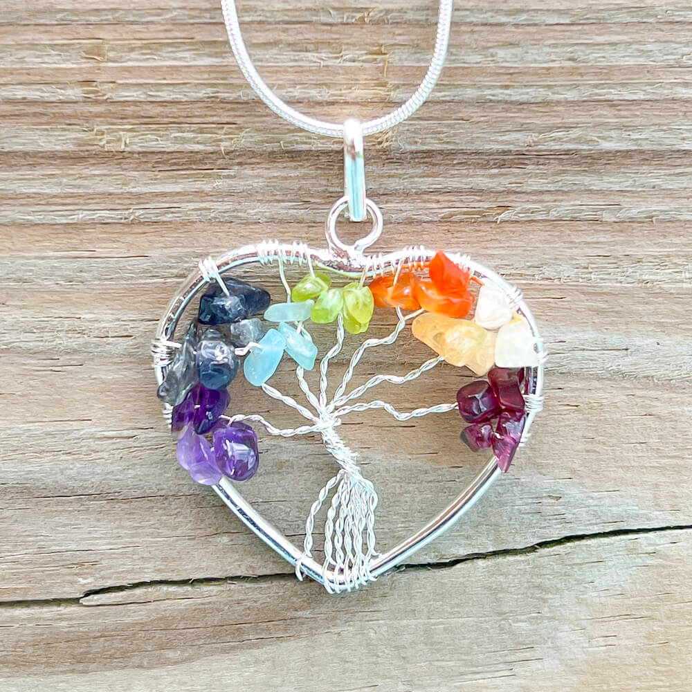 Check out our Tree of Life 7 Chakra Jewelry Wire heart Necklace when you shop at Magic Crystals. This beautiful 7 chakra necklace will help activate your Chakras to bring balance and energy into your life. Find the best seven chakra stones jewelry. FREE SHIPPING available. Chakra stones necklace for balance.