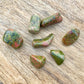 Looking for Unakite Stone, Tumbled Unakite, Unakite Wishing Stone? Shop at Magic Crystals. Shop for Unakite TUMBLED Africa - Tumbled Unakite - Heart Chakra - 4th Chakra - Fourth Chakra. Perfect for Reiki and Energy Healing. Unakite is a stone of vision.  Unakite helps to find balance through spirituality.