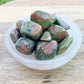 Looking for Unakite Stone, Tumbled Unakite, Unakite Wishing Stone? Shop at Magic Crystals. Shop for Unakite TUMBLED Africa - Tumbled Unakite - Heart Chakra - 4th Chakra - Fourth Chakra. Perfect for Reiki and Energy Healing. Unakite is a stone of vision. Unakite helps to find balance through spirituality.