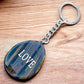 Palm Stone-Keychain. Tiger Eye Natural Stone Keychain. Tiger Eye may also bring good luck to the wearer. Tiger Eye Stone Single Point Keychain, Point Keychains at Magic crystals. Crystal Keychain, Pet Collar Charm, Bag Accessory, natural stone, crystal on the go, keychain charm, gift for her and him. 