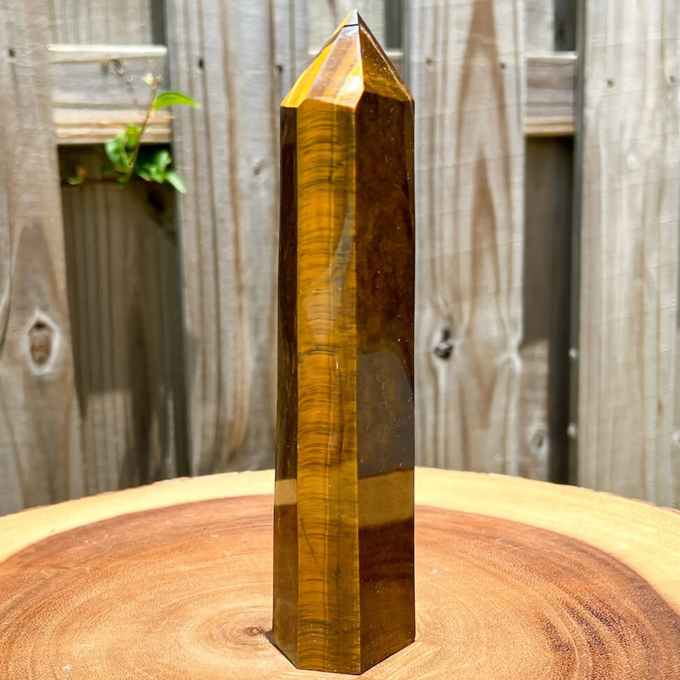 Looking for Natural Yellow Tiger Eye Obelisk? Shop at Magic Crystals for Tiger Eye Tower. Yellow Tiger Eye is a stone of protection and good luck. Natural Tiger Eye Crystal, Tiger Eye Point Wand, Generator Hexagonal Point (Reiki Healing Wand Point), Gemstone Wand.