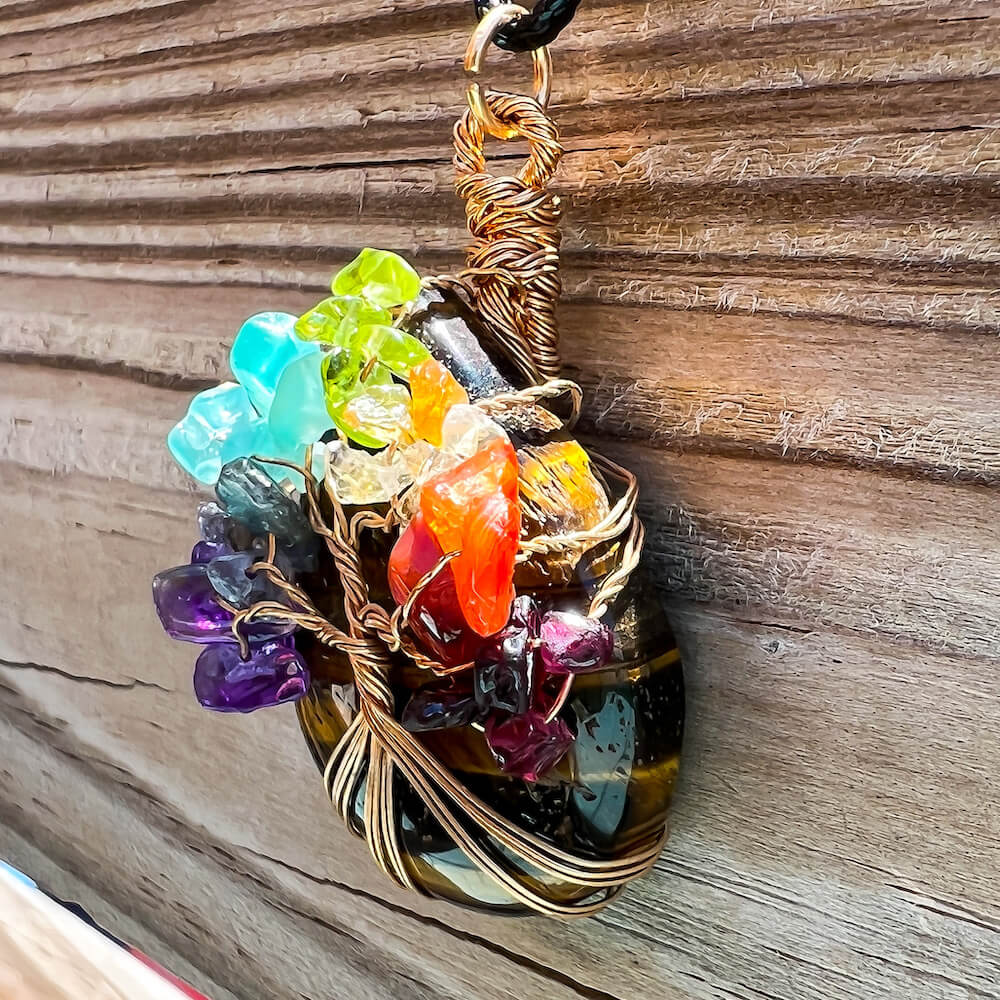    Yellow-Tiger-Eye-Tree-Of-Life-Chakra.Looking for a gift for mother/her, tree of life necklace, stone necklace, pendant? Shop at Magic Crystals for a 7 Chakra Tree Of Life Drop Necklace. 7 Chakra necklaces, and seven chakras jewelry pieces. Handmade Natural Amethyst Crystal. Amethyst Drop shape, teardrop, Protection Necklaces.