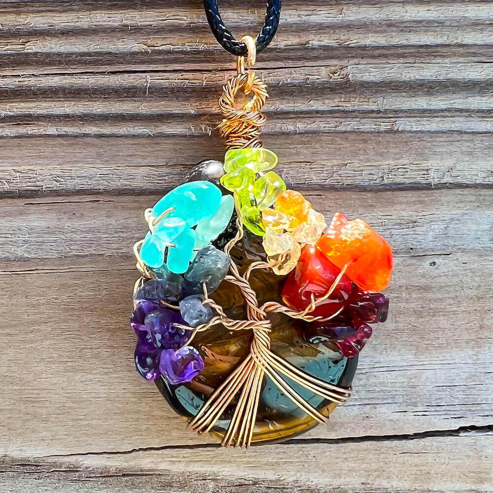    Yellow-Tiger-Eye-Tree-Of-Life-Chakra.Looking for a gift for mother/her, tree of life necklace, stone necklace, pendant? Shop at Magic Crystals for a 7 Chakra Tree Of Life Drop Necklace. 7 Chakra necklaces, and seven chakras jewelry pieces. Handmade Natural Amethyst Crystal. Amethyst Drop shape, teardrop, Protection Necklaces.